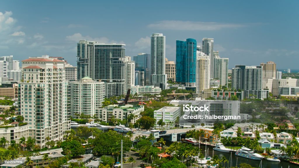 Drone Shot of Fort Lauderdale Aerial shot of the New River flowing through Fort Lauderdale, Florida on a sunny day. 

Authorization was obtained from the FAA for this operation in restricted airspace. Fort Lauderdale Stock Photo