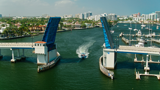 Drone shot of East Las Olas Boulevard Bridge in Fort Lauderdale, Florida on a sunny day.\n\nAuthorization was obtained from the FAA for this operation in restricted airspace.