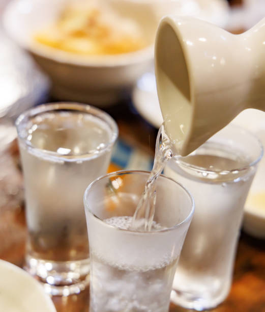 istock Delicious Japanese sake poured into a glass 1402198121