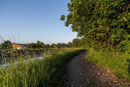 Greenery path for walkers along the New River in North London.