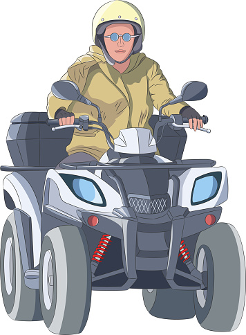 A young girl in a helmet is riding a black quad bike.