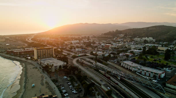 istock Sun Setting Behind Hills in Ventura, CA - Aerial 1402199666
