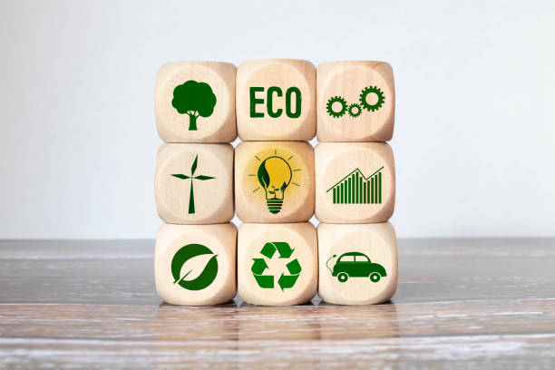 Carbon ecological footprint symbols on wooden cube with eco friendly icon. Carbon footprint, low carbon emission concept. Carbon ecological footprint symbols on wooden cube with eco friendly icon. Sustainable business development.Environmental, climate change concept. LCA. larnaca international airport stock pictures, royalty-free photos & images