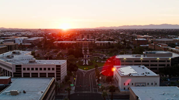 istock Sun Setting Behind Arizona State Capitol Complex - Aerial 1402208138