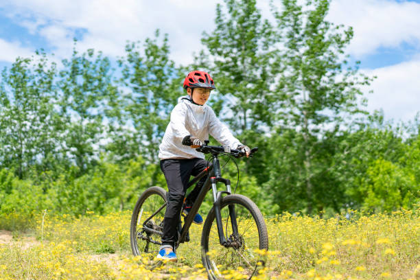istock Boy riding mountain bike 1402210667