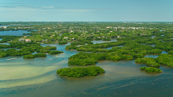 Aerial shot of the waterway between Seminole and St. Petersburg, Florida on a sunny day.\n\nAuthorization was obtained from the FAA for this operation in restricted airspace.