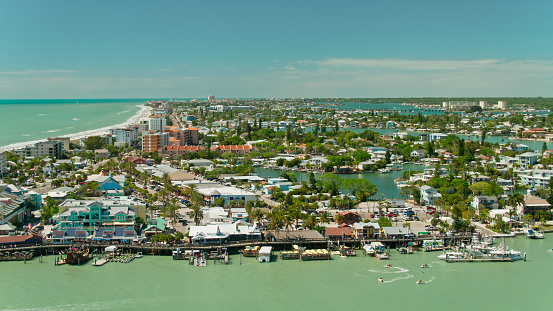 Aerial shot of the boardwalk in Madeira Beach, Florida on a sunny day.

Authorization was obtained from the FAA for this operation in restricted airspace.