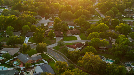 Aerial shot of the Orlando suburb of Longwood, Florida on a spring evening during golden hour.