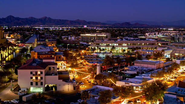 Old Town Scottsdale, Arizona - Aerial View Aerial establishing shot of the 5th Avenue Shopping District in Old Town Scottsdale, Arizona at twilight. 

Authorization was obtained from the FAA for this operation in restricted airspace. southwest usa architecture building exterior scottsdale stock pictures, royalty-free photos & images