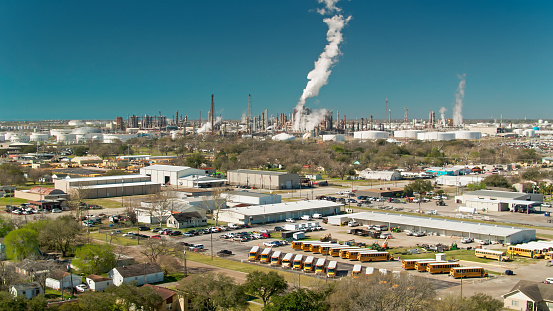 School Bus Depot Near Oil Refinery in Texas City - Aerial
