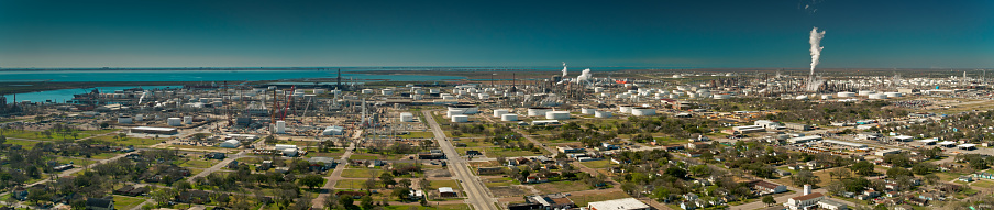 Stitched panoramic aerial shot of a residential neighborhood close to petrochemical plants and petroleum refineries in Texas City, in the Houston metropolitan area on Galveston Bay.