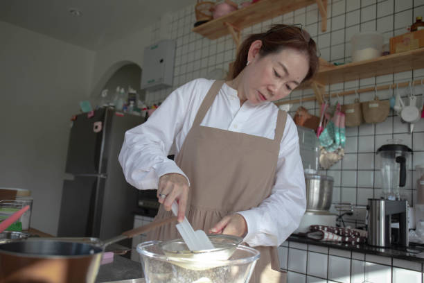istock Woman mixing ingredients 1402216663