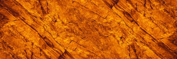 istock Orange red brown rock texture with cracks. Rough mountain surface. Close-up. Stone background for design. 1402218293