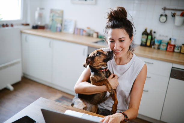 istock woman doing a video call with her pet 1402220975