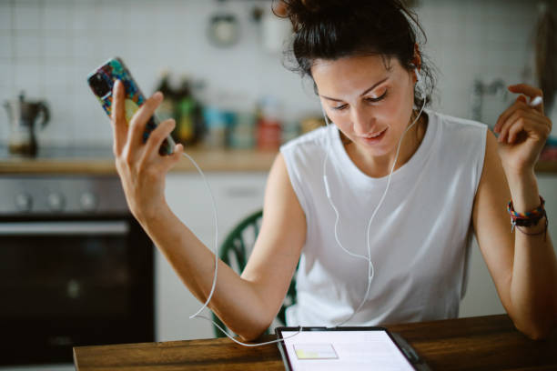istock Woman working at the kitchen desk 1402221652