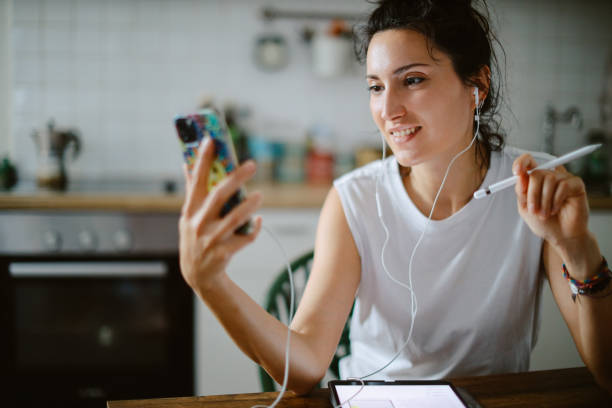 istock Woman working at the kitchen desk 1402221738