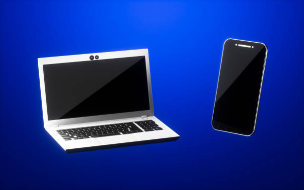 istock A laptop and a mobile phone with blue background, 3d rendering. 1402228856