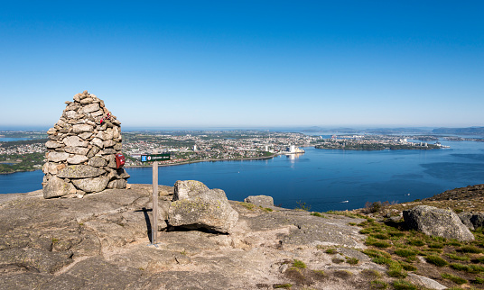 A spectacular viewpoint on Lifjel mountain top to Gandsfjord fjord and Stavanger city coastline, Sandnes, Norway, May 2018