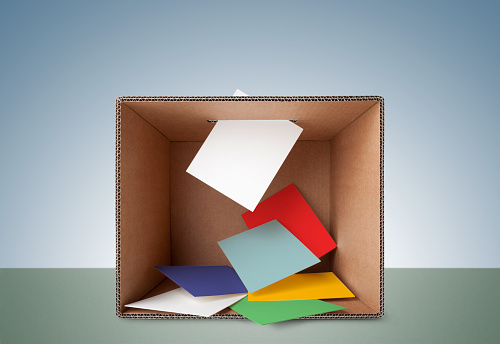 Vote. Ballot box with colored cards.