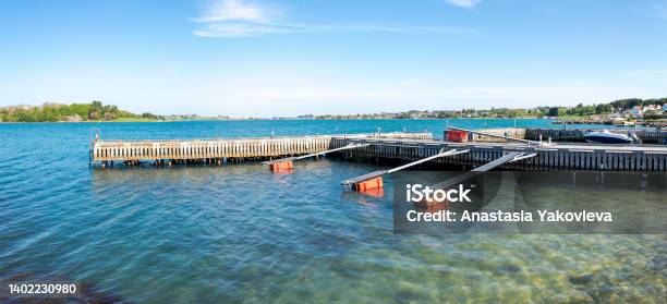 Boats Safe Parking Area At Wooden Jetties In Hafrsfjord Residential Suburb Area Stock Photo - Download Image Now