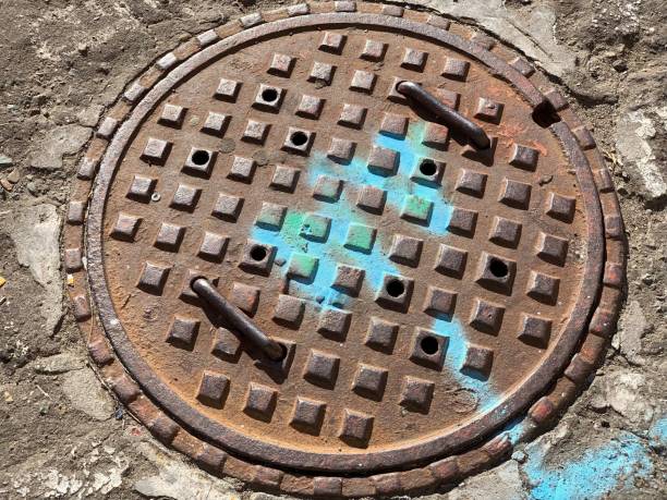 istock Manhole metal lid cover. 1402236793
