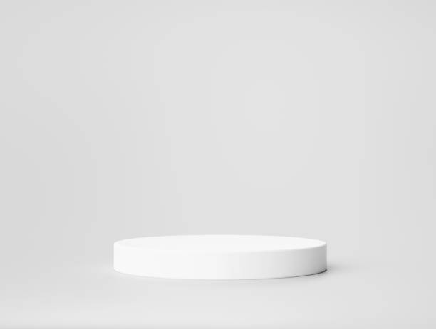 istock White cylinder podium pedestal product display platform for product placement background 3d rendering 1402237422