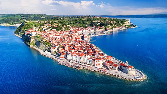 Piran, Slovenia. Beautiful aerial view on Piran town, ancient buildings with red roofs and Adriatic sea in southwestern Slovenia