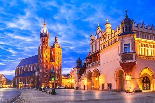 Krakow, Poland. St Mary's church and Cloth Hall on Main Market Square in Cracovia, illuminated in the night
