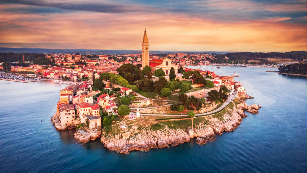 Rovinj, Croatia - Aerial drone view of historical Istria city Rovinj, Croatia. Aerial drone sunset view of historical center of Rovinj old town and Adriatic Sea, Istria region, Europe. Travel background concept. rovinj harbor stock pictures, royalty-free photos & images