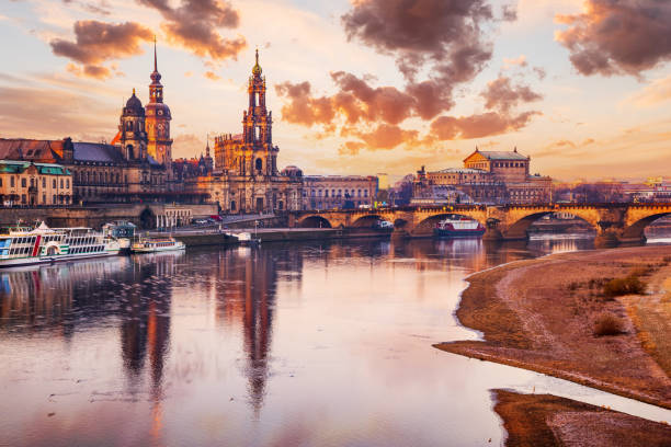 Dresden, Germany - Elbe River sunrise with Hofkirche and Bruehl Terrase. Dresden, Germany. Hofkirche, cathedral of the Holy Trinity, Bruehl's Terrace and Elbe river, sunrise beautiful light, Saxony. dresda stock pictures, royalty-free photos & images