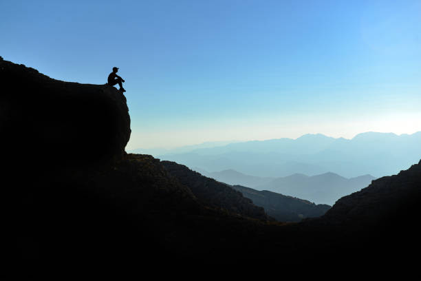 istock observing, watching and enjoying the view in the target peak mountains 1402241510