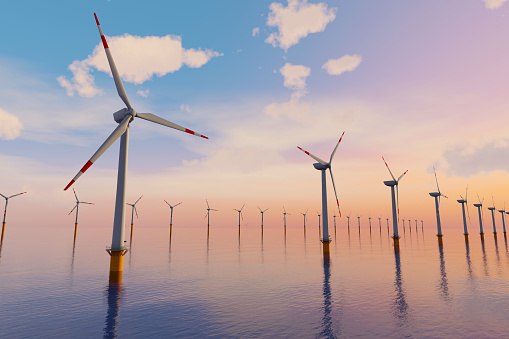 3D Rendering of Giant wind turbines farm located in the open sea, sunset shot. Concept of renewal energy using windmills.