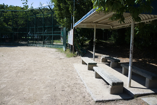 Dejimanishi Park in Hiroshima City, Hiroshima Prefecture, Japan. A park with a playground and a baseball field.