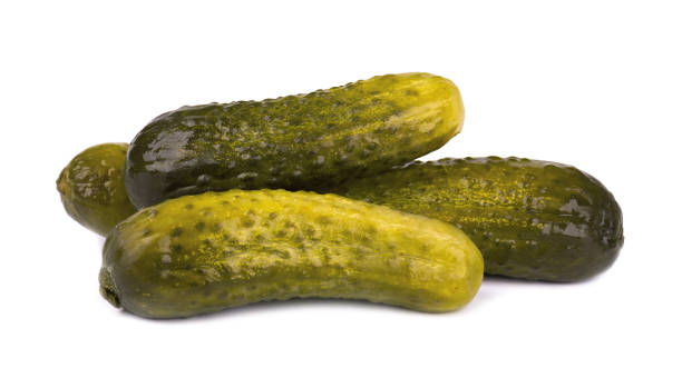istock Marinated pickled cucumber isolated on white background. Pickled cucumber with clipping path. Closeup. 1402253934