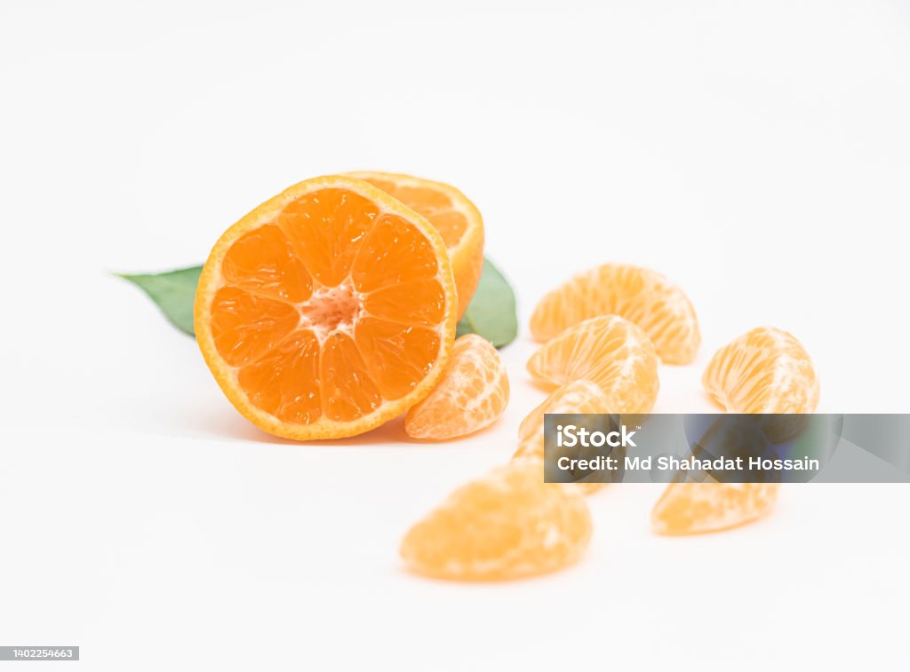 Tangerine or clementine with green leaf isolated on white background Bangladesh Stock Photo
