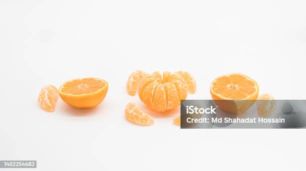 Selective Focus Tangerine Or Kamala Isolated On White Background Front View Stock Photo - Download Image Now