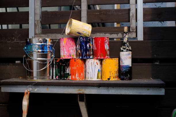 Empty paint buckets found at the alley of Seochon. Colorful arrangement made the empty buckets looks like an artwork.