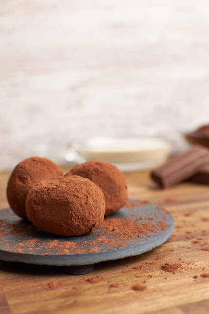 istock Healthy chocolate truffles with ingredients 1402260844