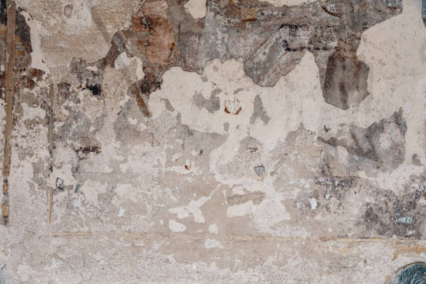istock Texture of an old peeling plastered wall 1402261421