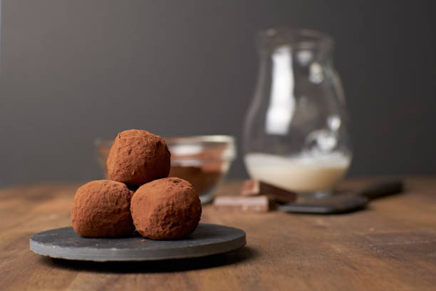 istock Healthy chocolate truffles with ingredients 1402265739
