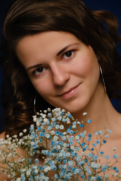 istock girl with flowers 1402270520