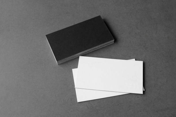 istock Business card on black background. 1402277399
