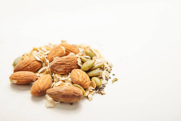 Almond with shell. It's other name Prunus amygdalus and Prunus dulcis. The almond is also the name of the edible and widely cultivated seed of this tree. indian almond.