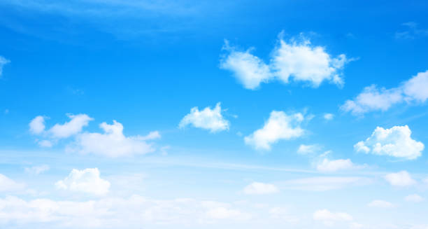 istock Sunny day background, blue sky with white cumulus clouds 1402280308