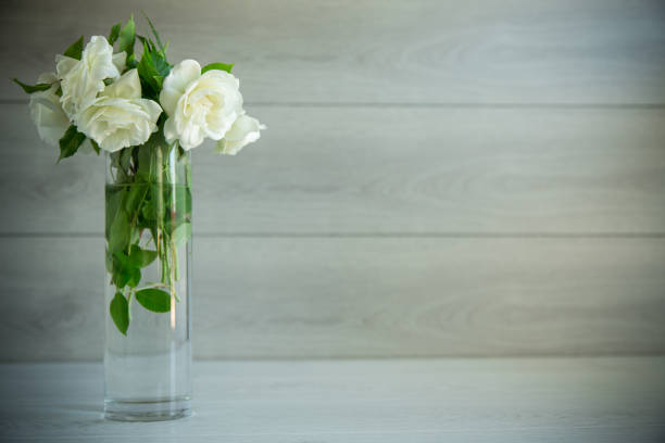 istock bouquet of beautiful white roses on table 1402281231