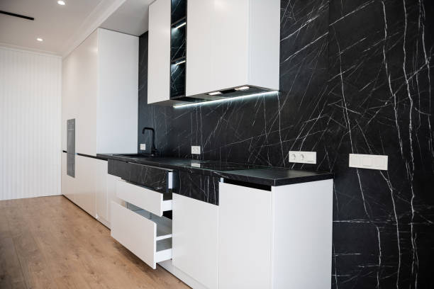 istock new kitchen with black and white facades open doors 1402284611