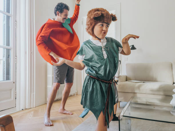 istock Costumed family having fun at home 1402287414