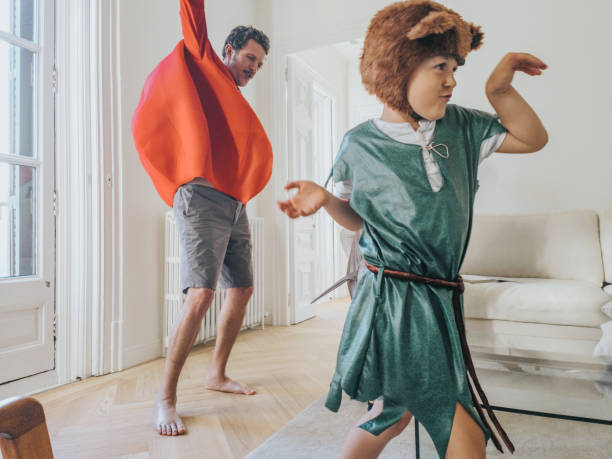 istock Costumed family having fun at home 1402287416