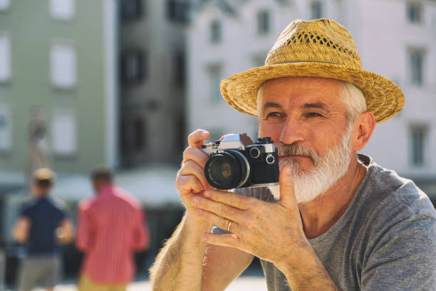 istock Senior photographer arranging his models 1402290088