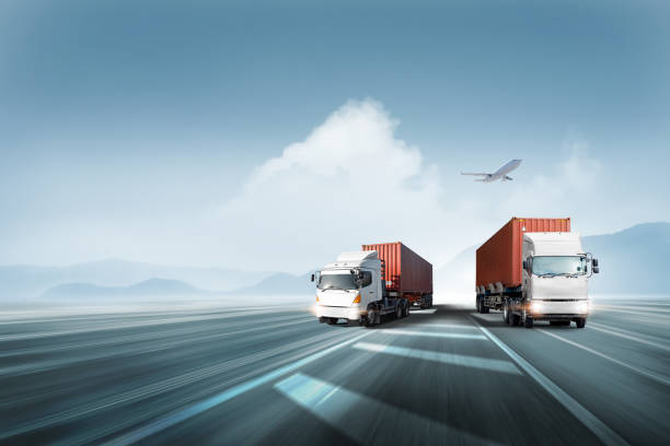 Logistics import export and cargo transportation industry concept of Container Truck run on highway road at sunset blue sky background with copy space, cargo airplane, moving by motion blur effect stock photo